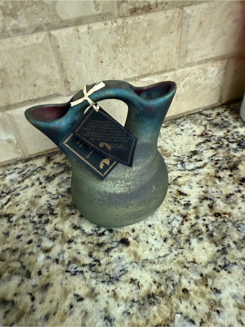 Handcrafted Green Pueblo-Style Pottery Vase with Bead and Feather Accent